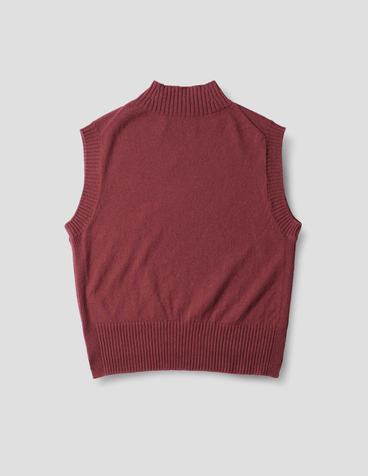 Reddish wool cotton slipover with a high rib neck, rib armholes and hem, back flat lay view.