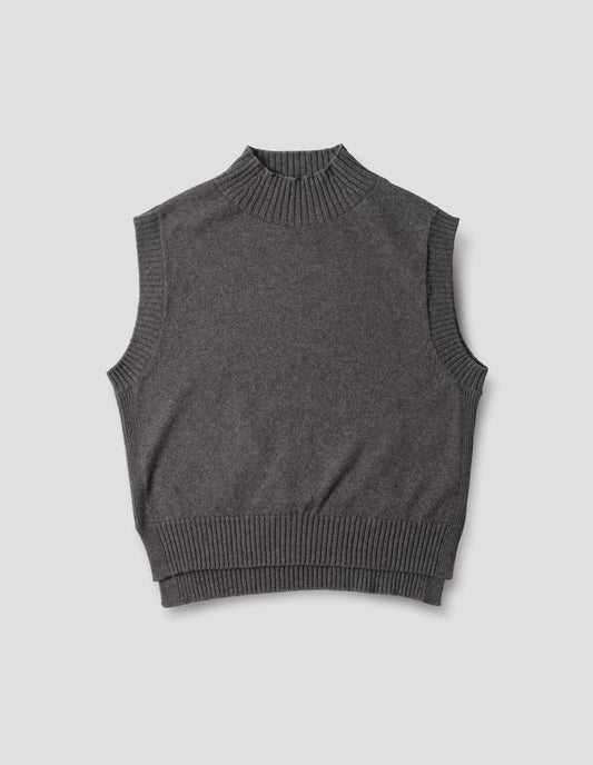 Grey wool cotton slipover with a high rib neck, rib armholes and hem and split stepped hem, front flat lay view.
