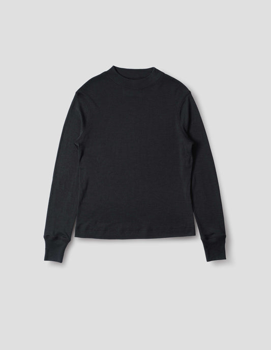 Black long sleeve t shirt with set-in sleeves, a rib neck and cuffs with flatlock stitching. Front flat lay view.