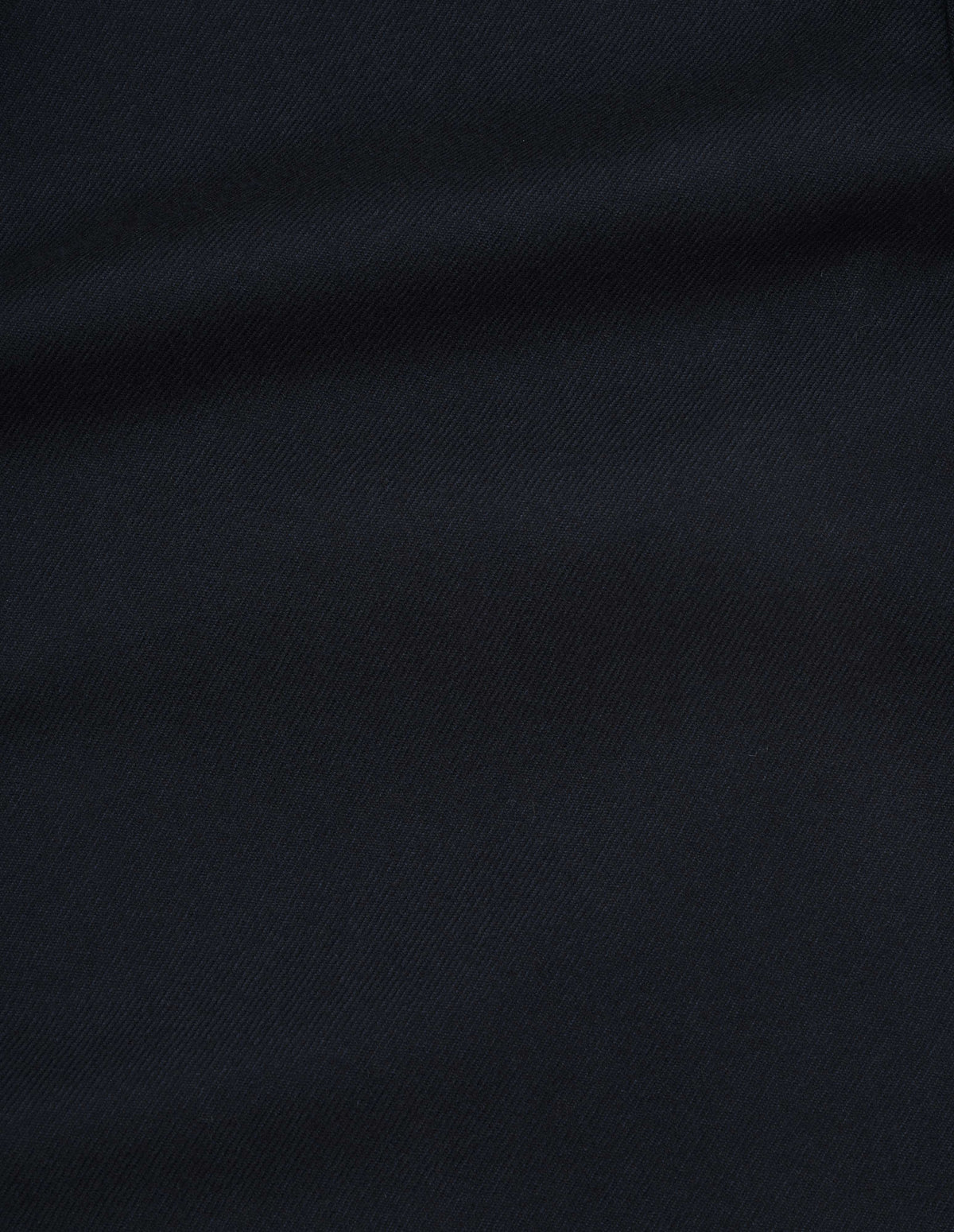 Dark blue brushed wool twill blazer fabric swatch.