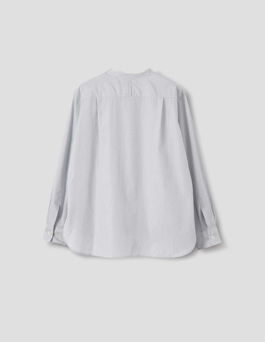 White collarless cotton shirt with dark blue stripes, narrow shoulder yoke with hanger loop, curved stepped hem and mother of pearl buttons on cuffs. Back flat lay view.