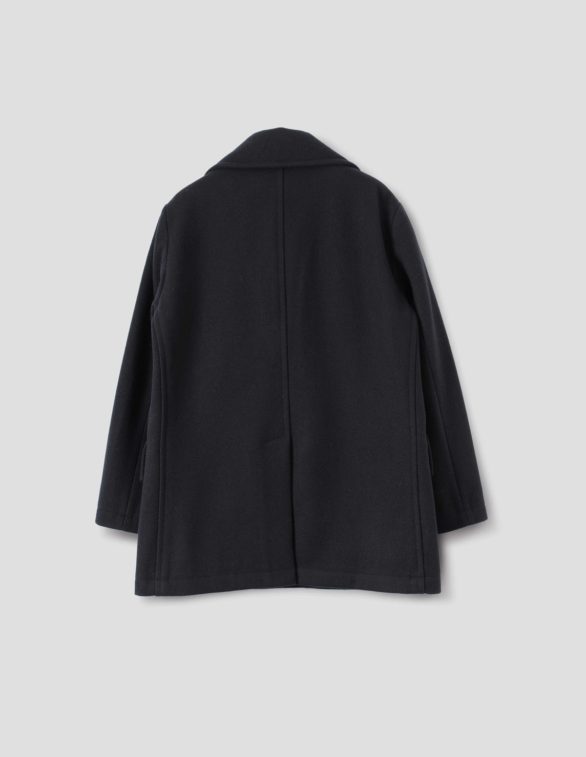 Dark blue wool coat with large collar, centre back seam and rear vent. Back flat lay view.