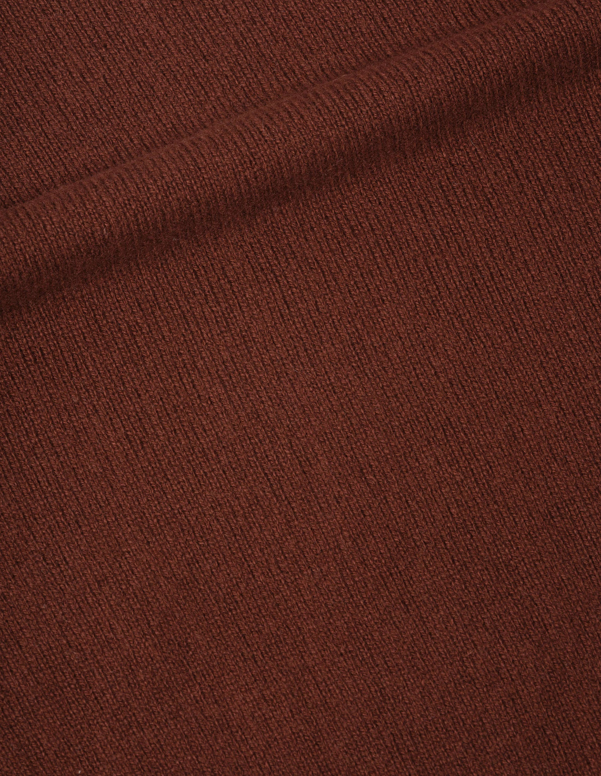 Brown merino cashmere jumper fabric swatch.