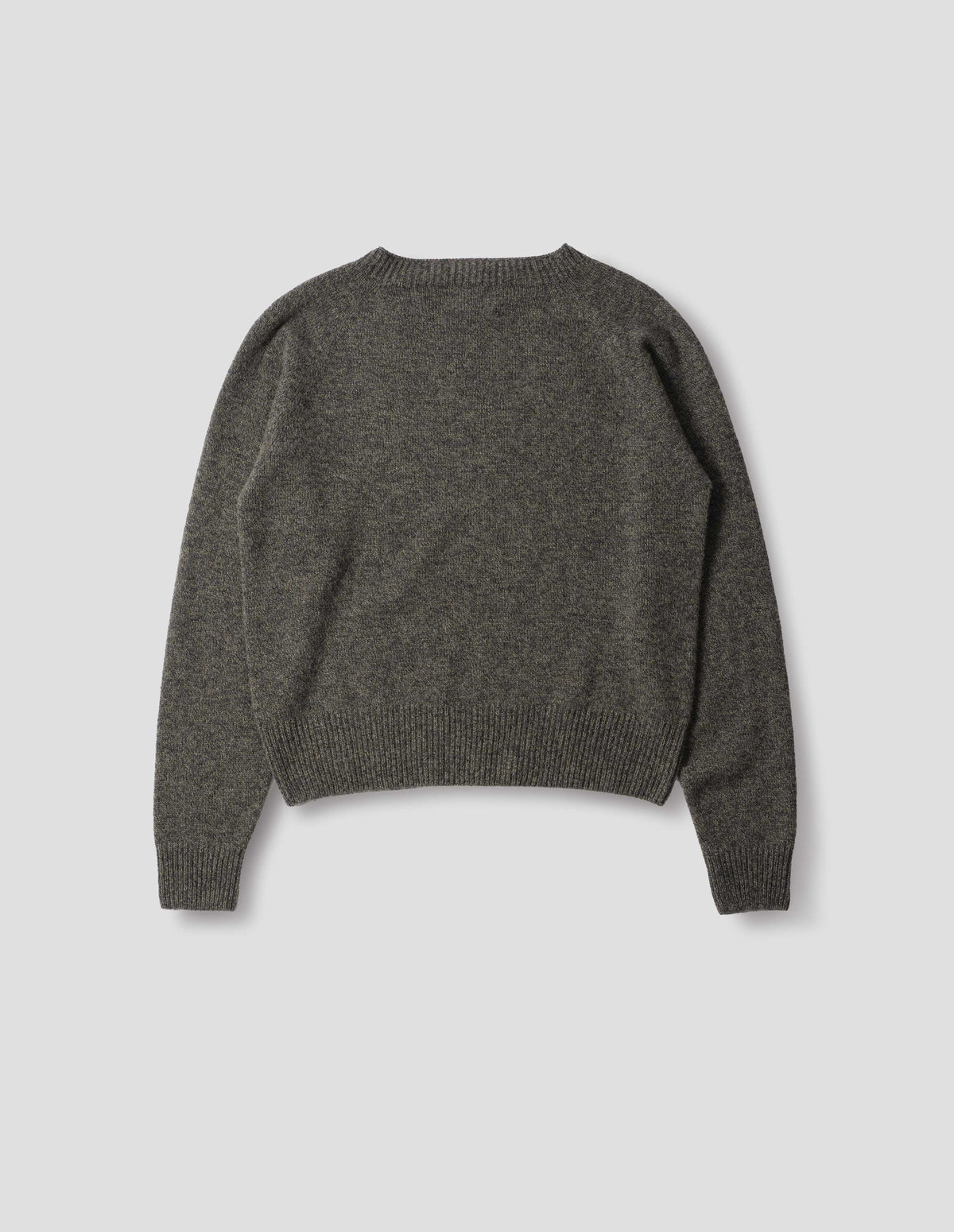Brownish grey fully fashioned seamless merino cashmere jumper with crew neck, raglan sleeve, and with ribbed neck, cuffs and hem. Back flat lay view.