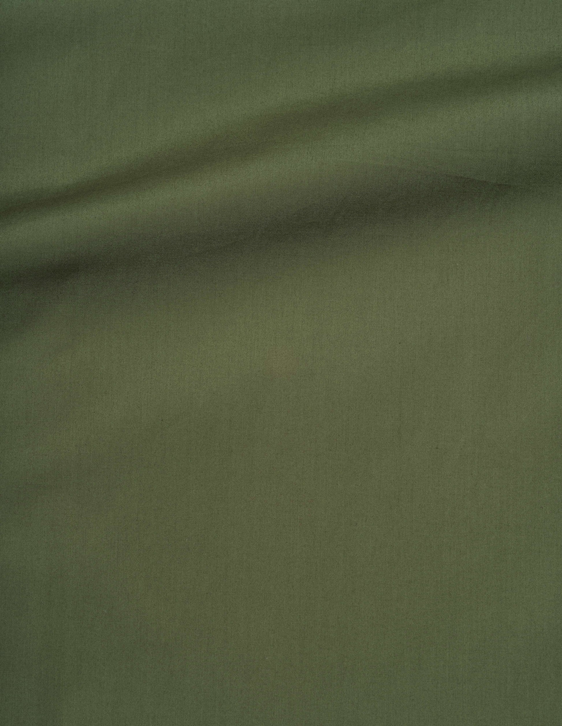 Green double twist cotton poplin shirt fabric swatch.