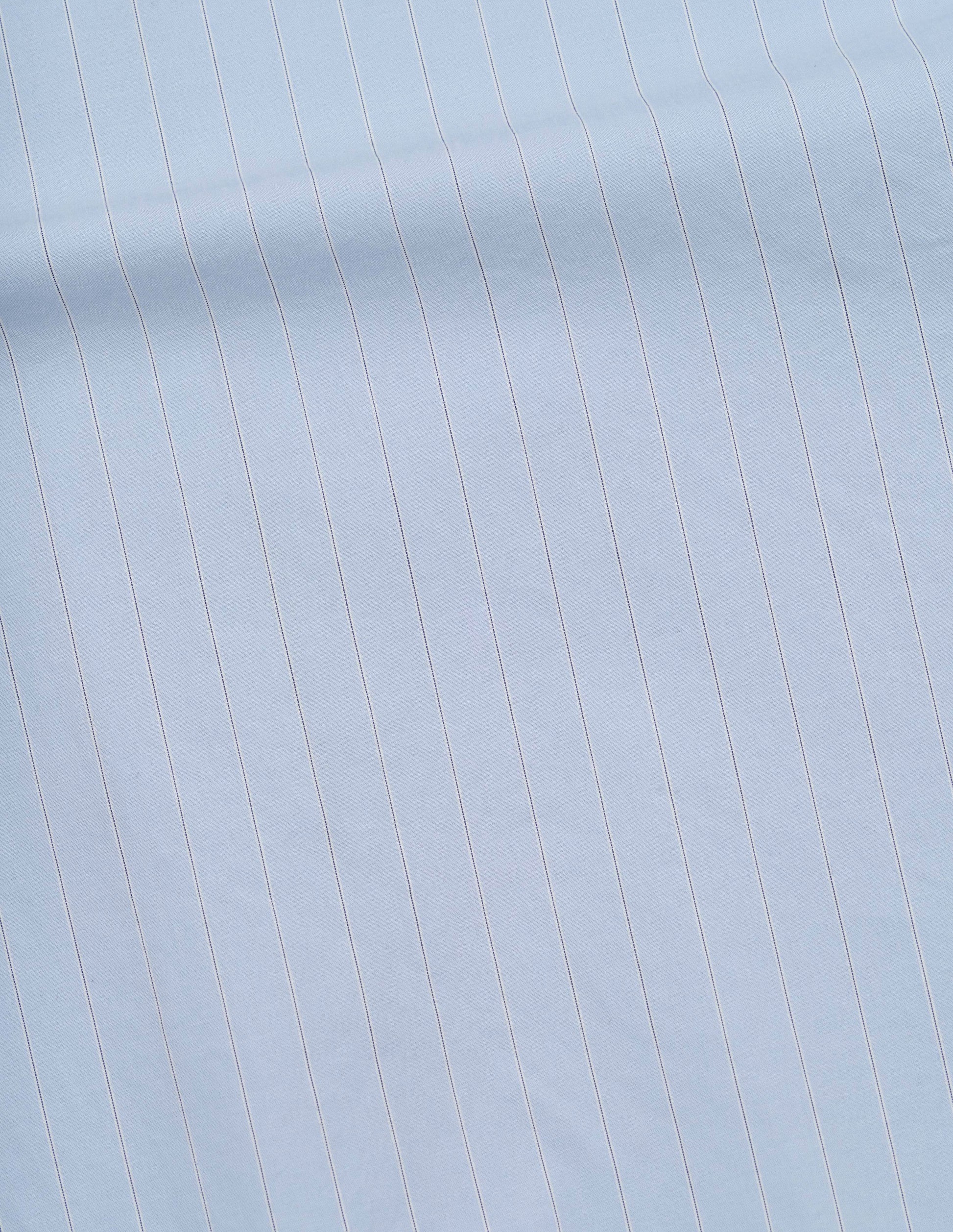 Light blue with grey and beige faded cotton stripe shirt fabric swatch.