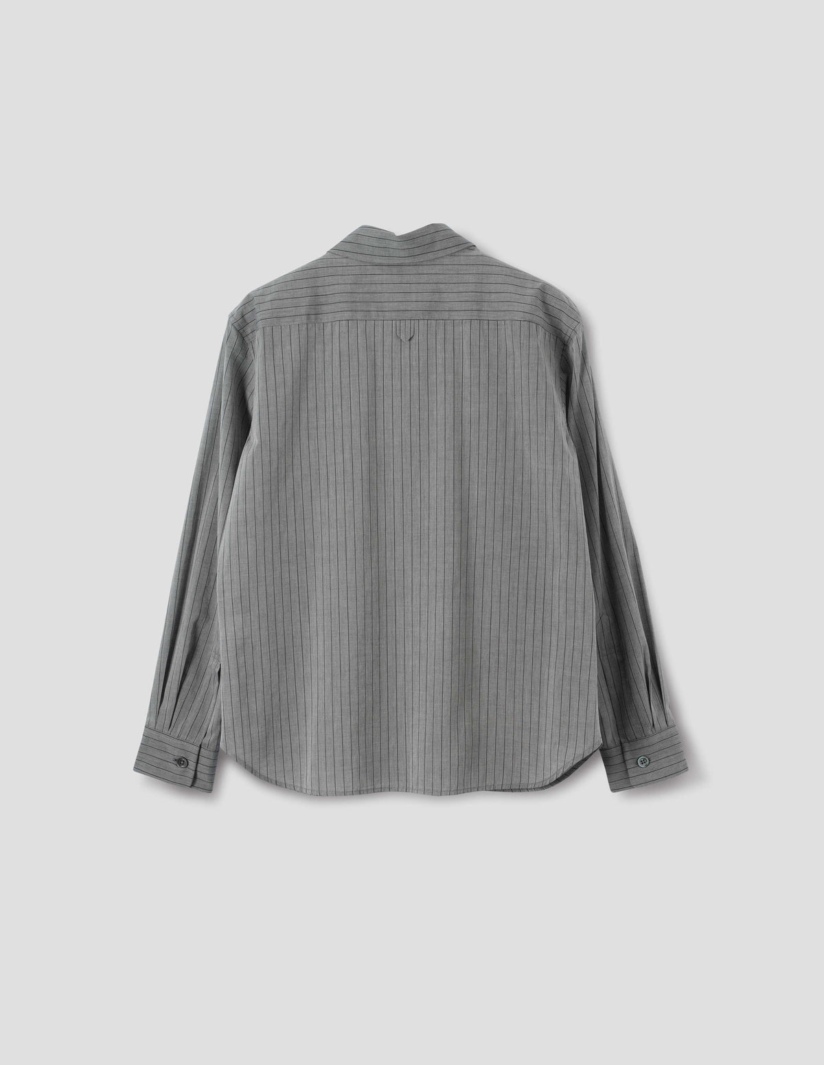 Grey cotton shirt with black stipes, hanger loop detail on back yoke, mother of pearl buttons on cuffs and curved hem. Back flat lay view.