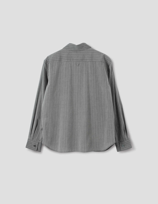 Grey cotton shirt with black stipes, hanger loop detail on back yoke, mother of pearl buttons on cuffs and curved hem. Back flat lay view.