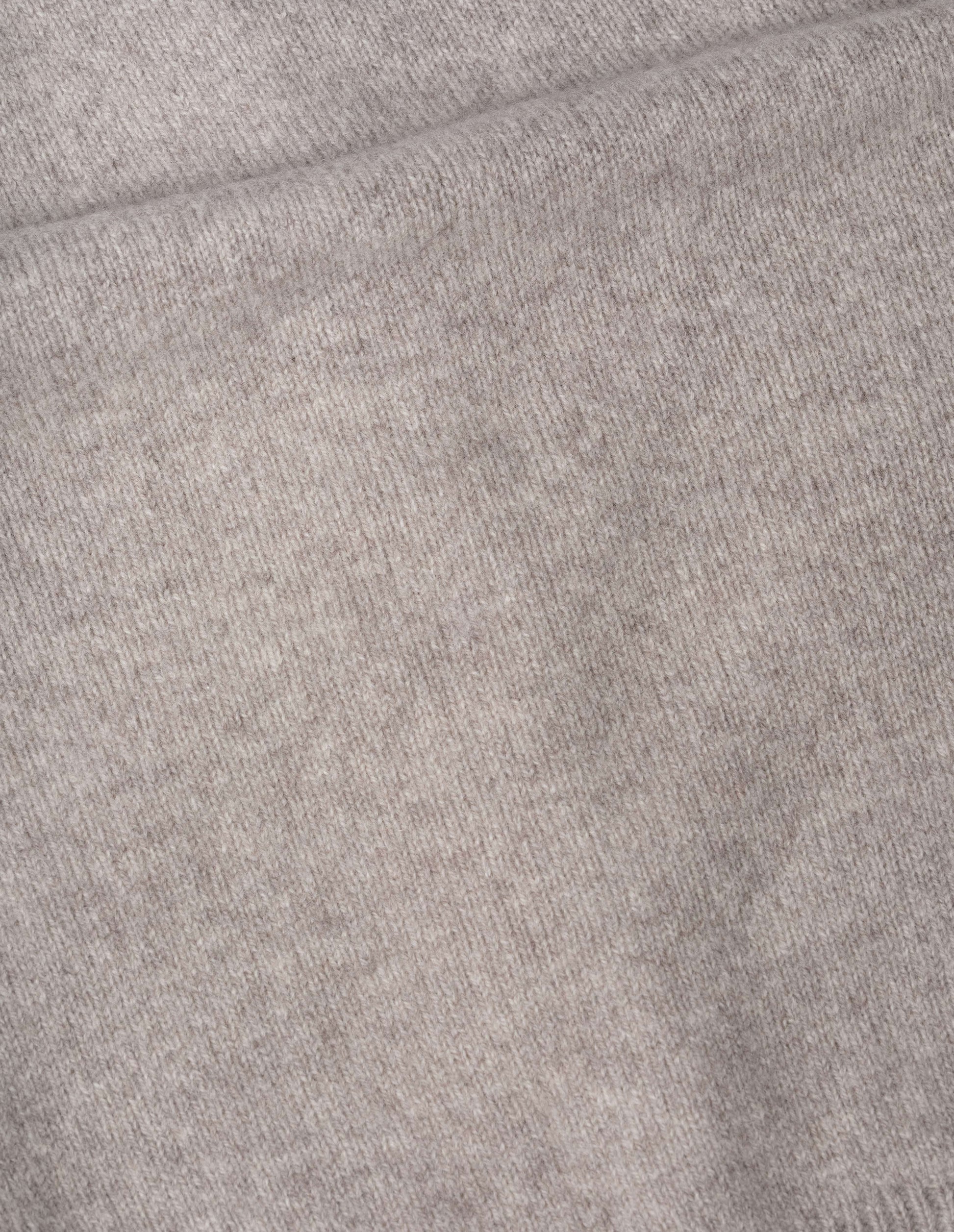 Beige merino cashmere cardigan fabric swatch.