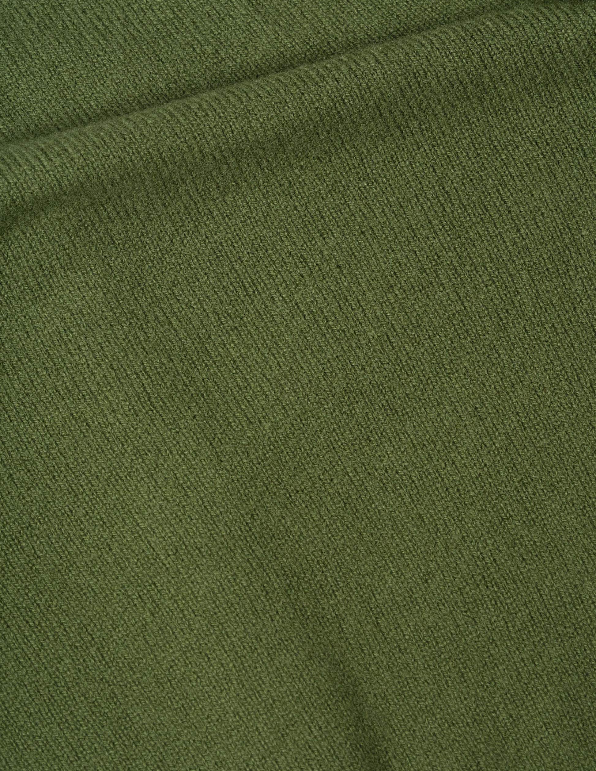 Green merino cashmere cardigan fabric swatch.