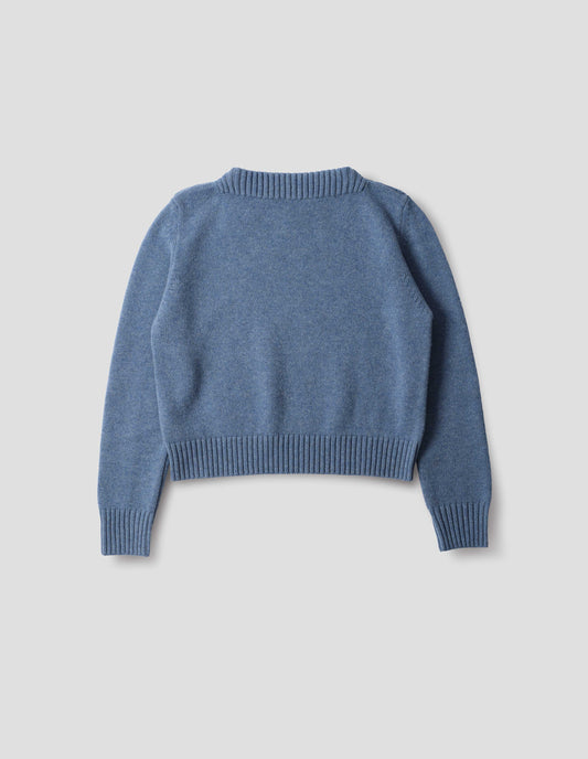 Light blue merino cashmere fully fashioned jumper with higher square neckline and with wide rib detailing on neck, cuffs and hem. Back flat lay view.