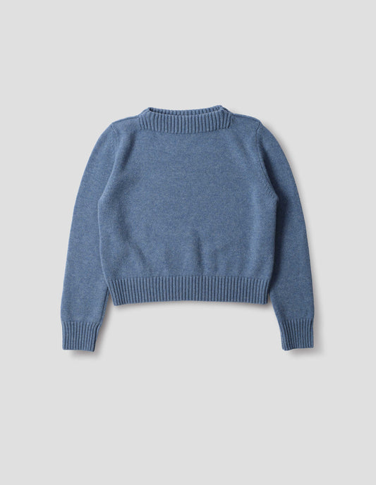 Light blue merino cashmere fully fashioned jumper with higher square neckline and with wide rib detailing on neck, cuffs and hem. Front flat lay view.