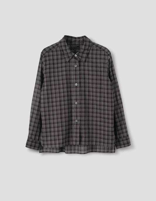 Black and white cotton check shirt with mother of pearl buttons on placket, stepped hem with curved front and straight-cut back. Front flat lay view.