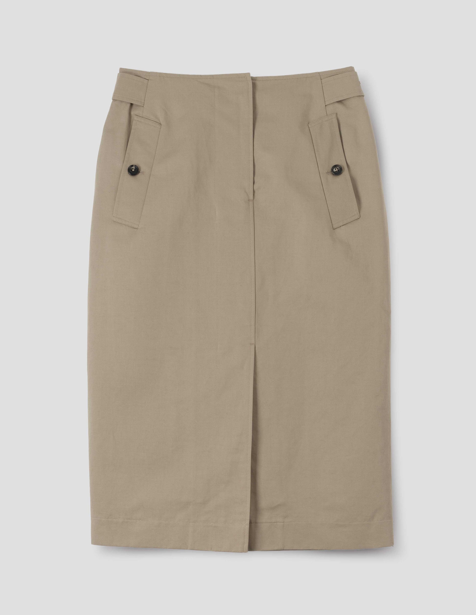 Beige cotton linen skirt with concealed zip fly and hook and bar fastening, waist cinch detail, horn button-through slanted welt pockets, centre front vent split stitch-through hem. Front flat lay view.