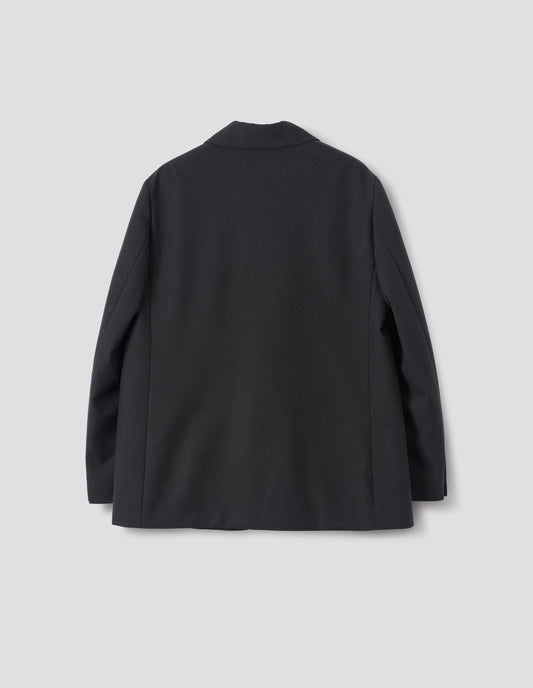 Black wool blazer with horn buttons on cuffs. Back flat lay view.