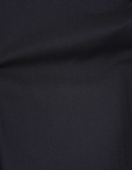 Dark blue wide wool herringbone trousers fabric swatch.