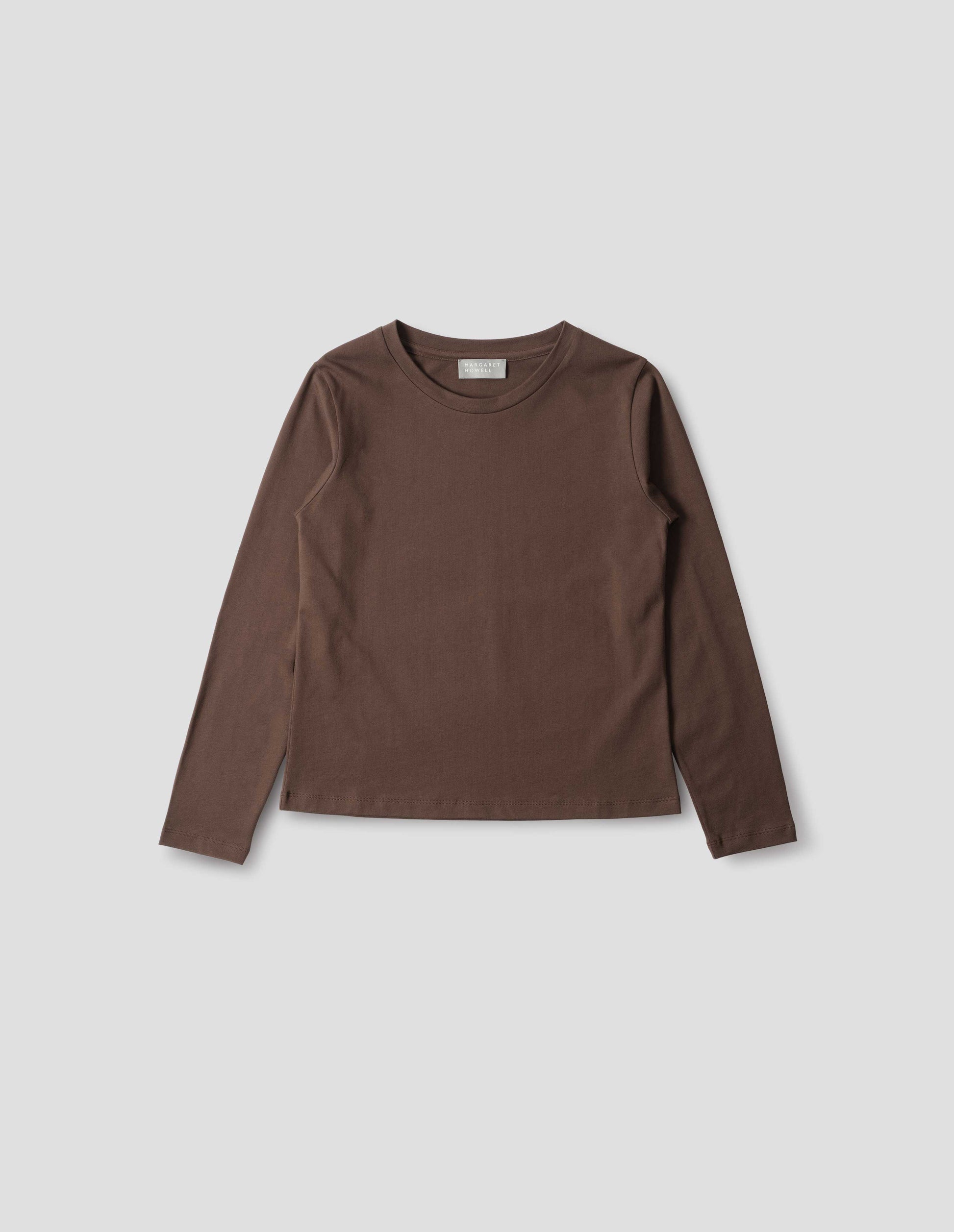 Dark brown jersey t-shirt with wide neck and long sleeves. Front flat lay view.