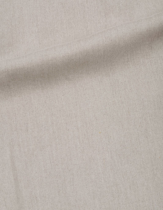 Beige back vent skirt compact linen yarn dye fabric swatch.