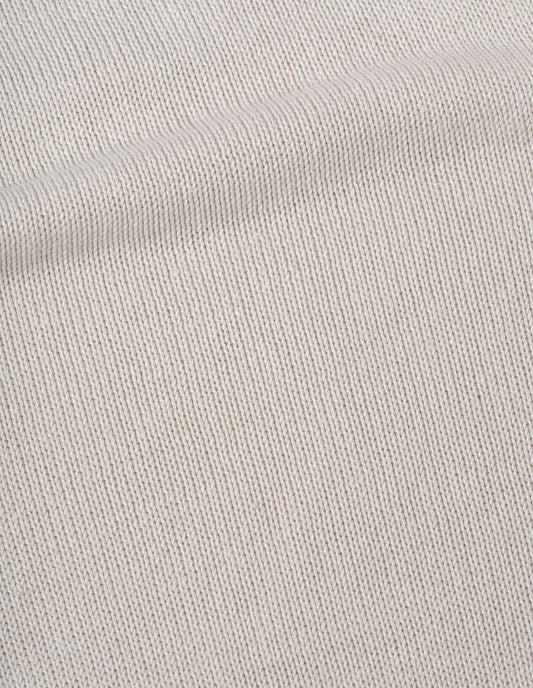 Beige jumper linen cotton fabric swatch.