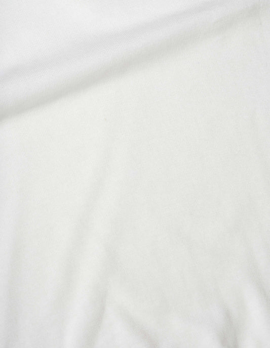 White knitted vest fine linen cotton fabric swatch.