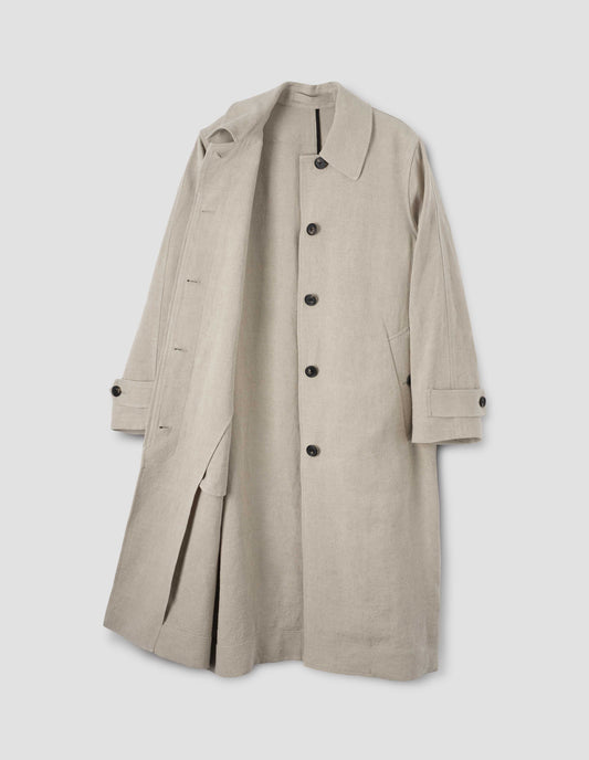 Beige long linen mac with button fastening, button welt pockets and button tab cuffs, with a detachable leather buckle belt, front open flat lay view.