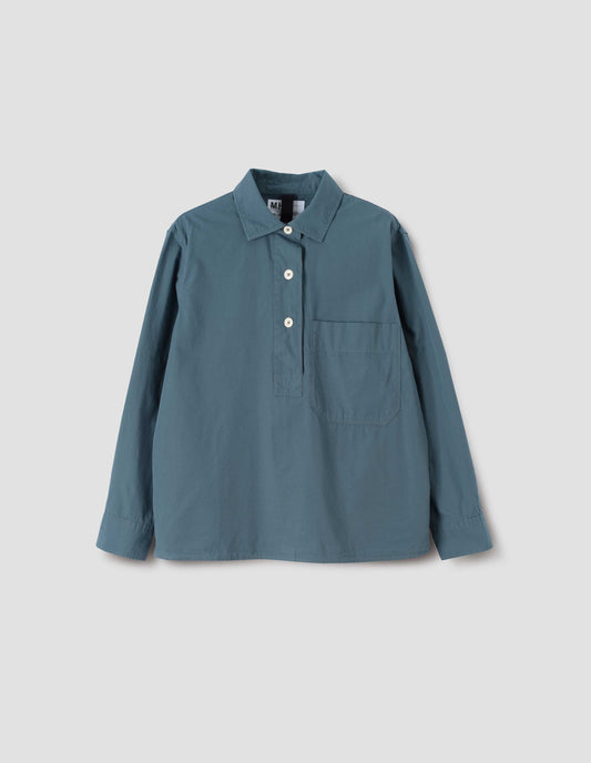 Blue long sleeve shirt, with corozo button half placket and large chest pocket, front flat lay view.