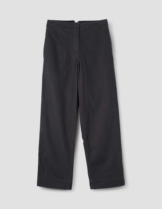 Dark blue straight leg trousers with zip fastening, front flat lay view.