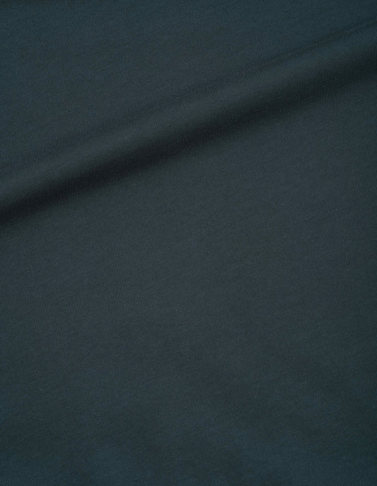 Blue-green dress light cotton jersey fabric swatch.