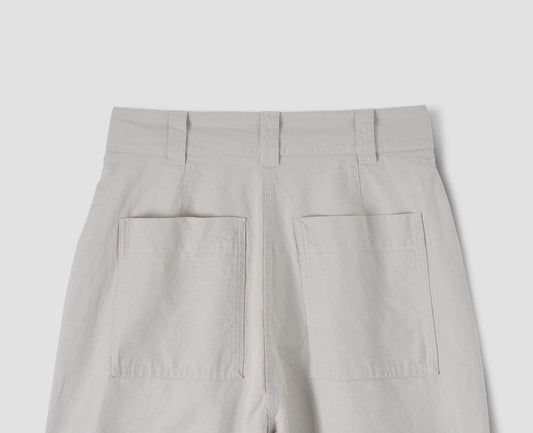 Light grey trousers with two back pockets and three belt loops, back flat lay view.