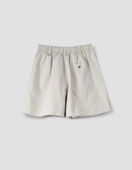 Light grey shorts with elasticated waist, three belt loops with one D-ring detail and press stud fastening on back pocket, back flat lay view. 