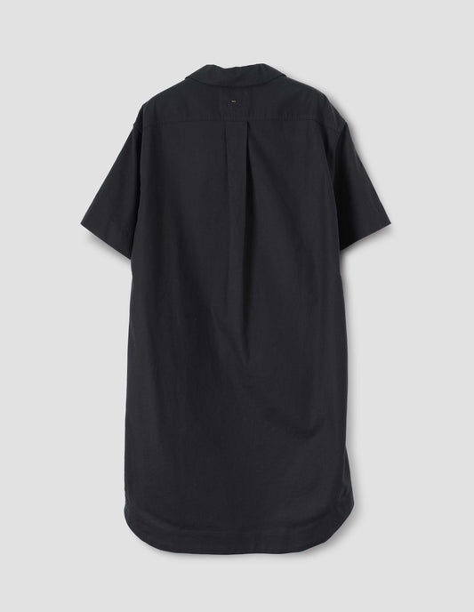 Black shirt dress with short sleeves and back pleat, back flat lay view.
