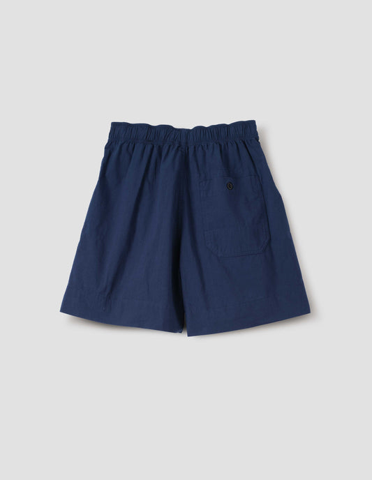 Blue shorts with elasticated waist and button-through patch pocket, back flat lay view.