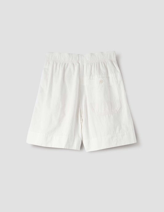 White shorts with elasticated waist and button-through patch pocket, back flat lay view.