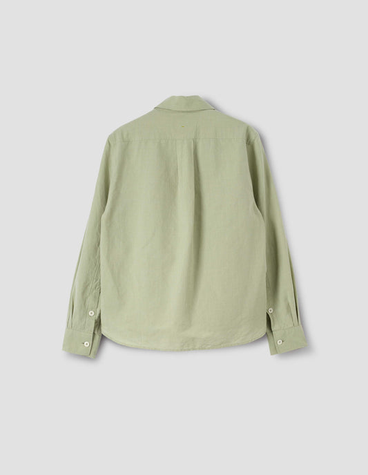 Light green long sleeve shirt with corozo button cuffs and box pleat on back yoke, back flat lay view. 