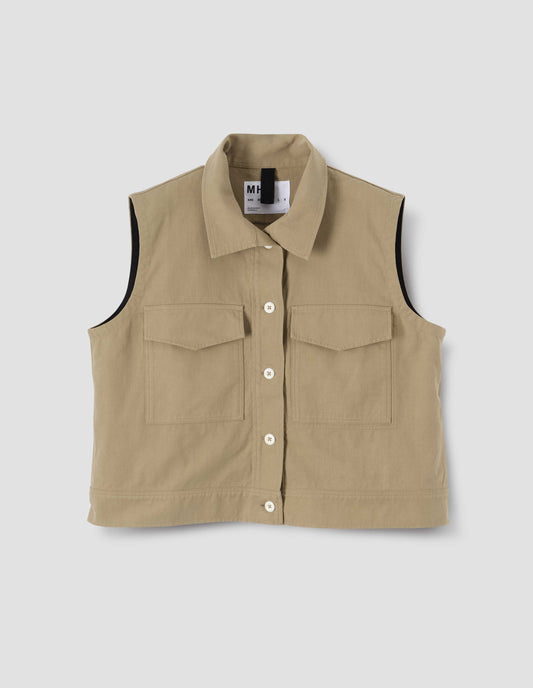 Beige sleeveless shirt with corozo button closure and two flap chest pockets, front flat lay view. 
