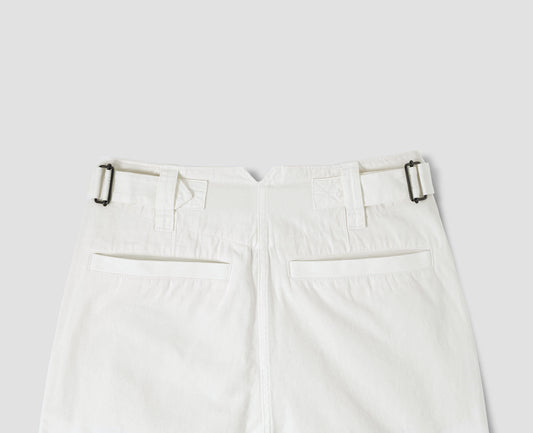 White trousers with side adjusters and welt back pockets, back flat lay view.