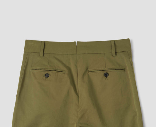 Green trousers with side pockets, belt loops and button-through welt back pockets, back flat lay view.