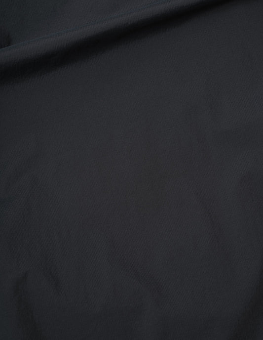 Dark blue trousers nylon ripstop fabric swatch.