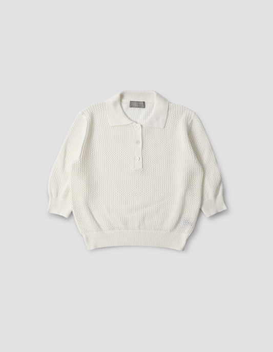 Beige pointelle polo shirt with mother of pearl buttons and cropped sleeves, front flat lay view.