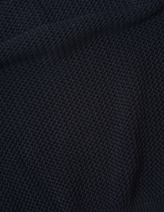 Dark blue pointelle polo light cotton cashmere fabric swatch.
