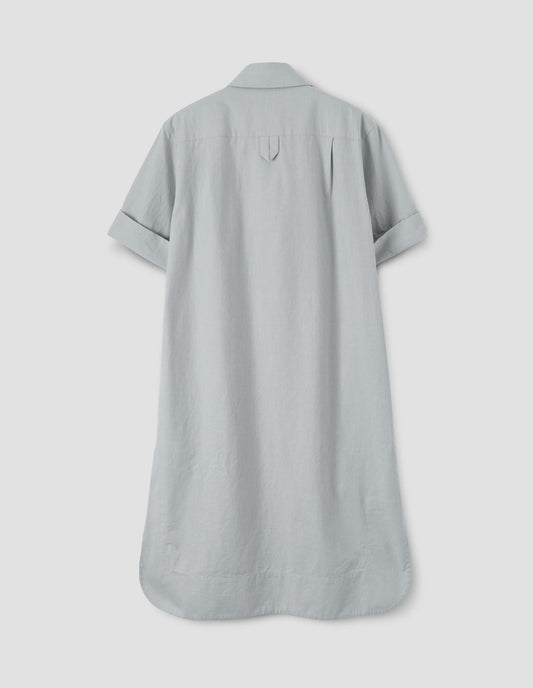 Light grey shirt dress with short sleeves and hanger loop detail on back, back flat lay view.