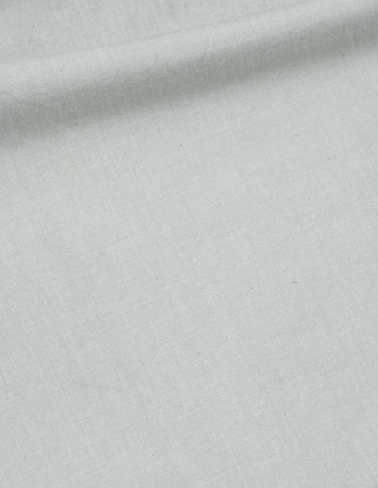 Light grey dress natural dye cotton poplin fabric swatch.