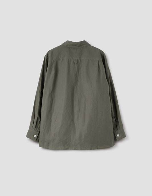 Brown linen long sleeve shirt with mother of pearl button cuffs and hanger loop on back yoke, back flat lay view.