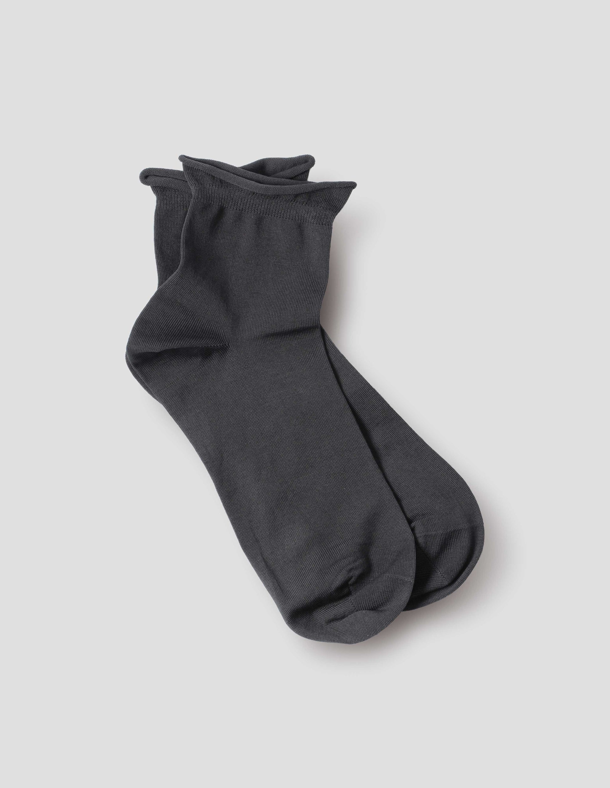 Dark grey short cotton sock with roll top detailing, front flat lay view.