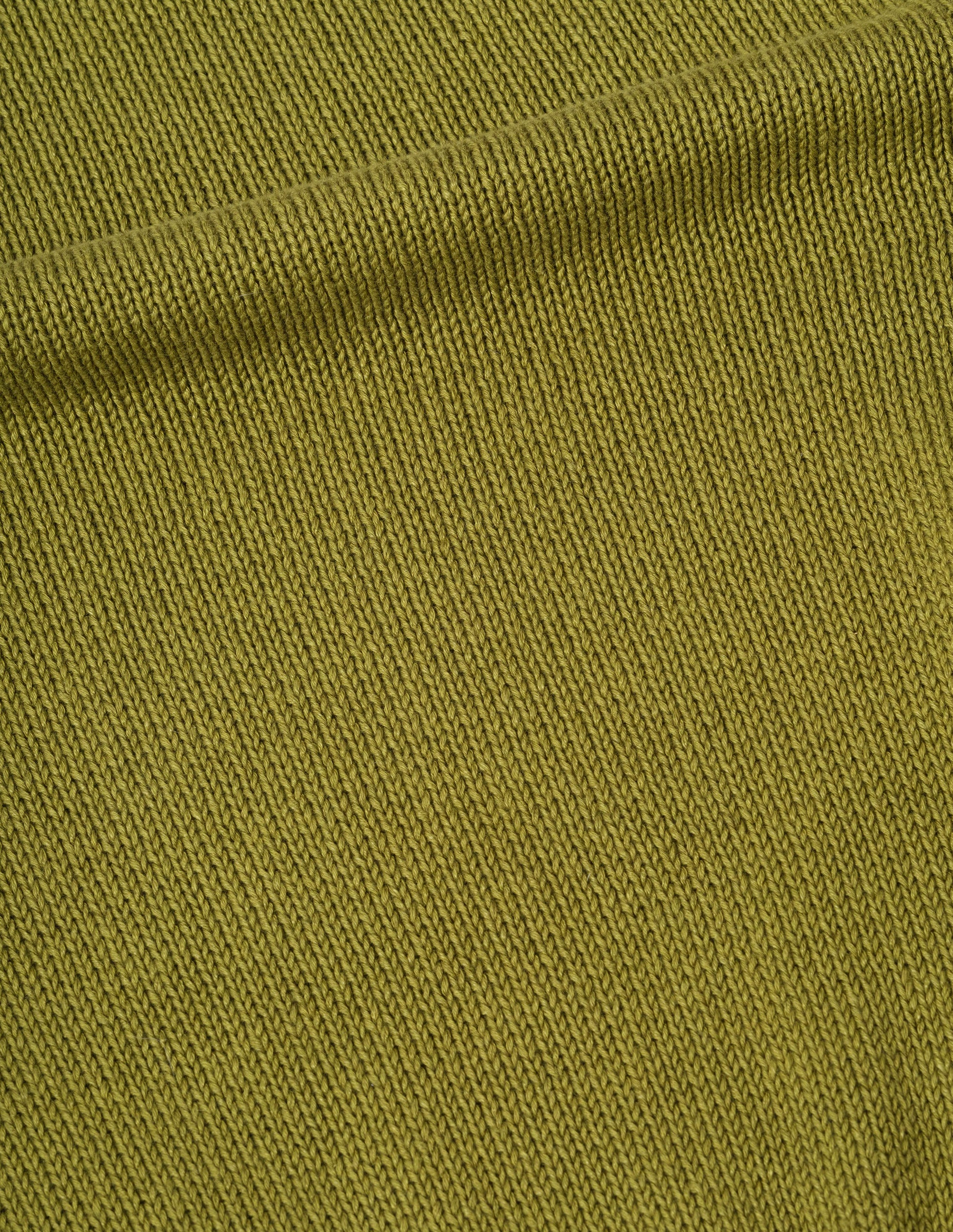 Greenish yellow linen cotton jumper, fabric swatch.