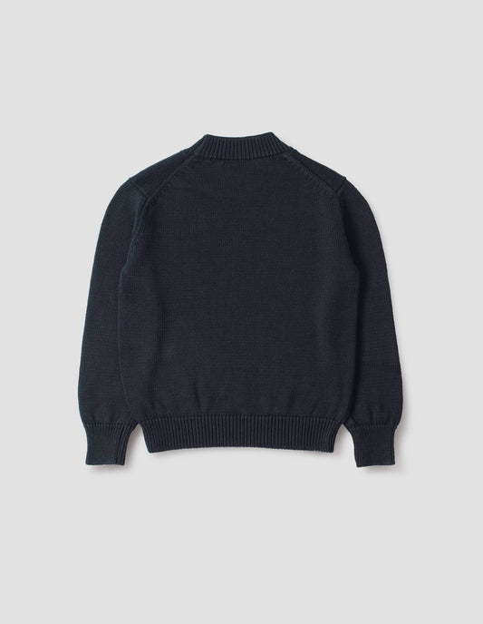 Dark navy blue linen and cotton crew neck jumper, with deep rib crew neck, rib cuffs and hem. Back flat lay view.