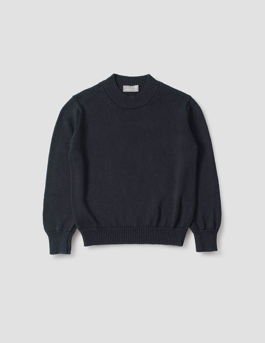 Dark navy blue linen and cotton crew neck jumper, with deep rib crew neck, rib cuffs and hem. Front flat lay view.