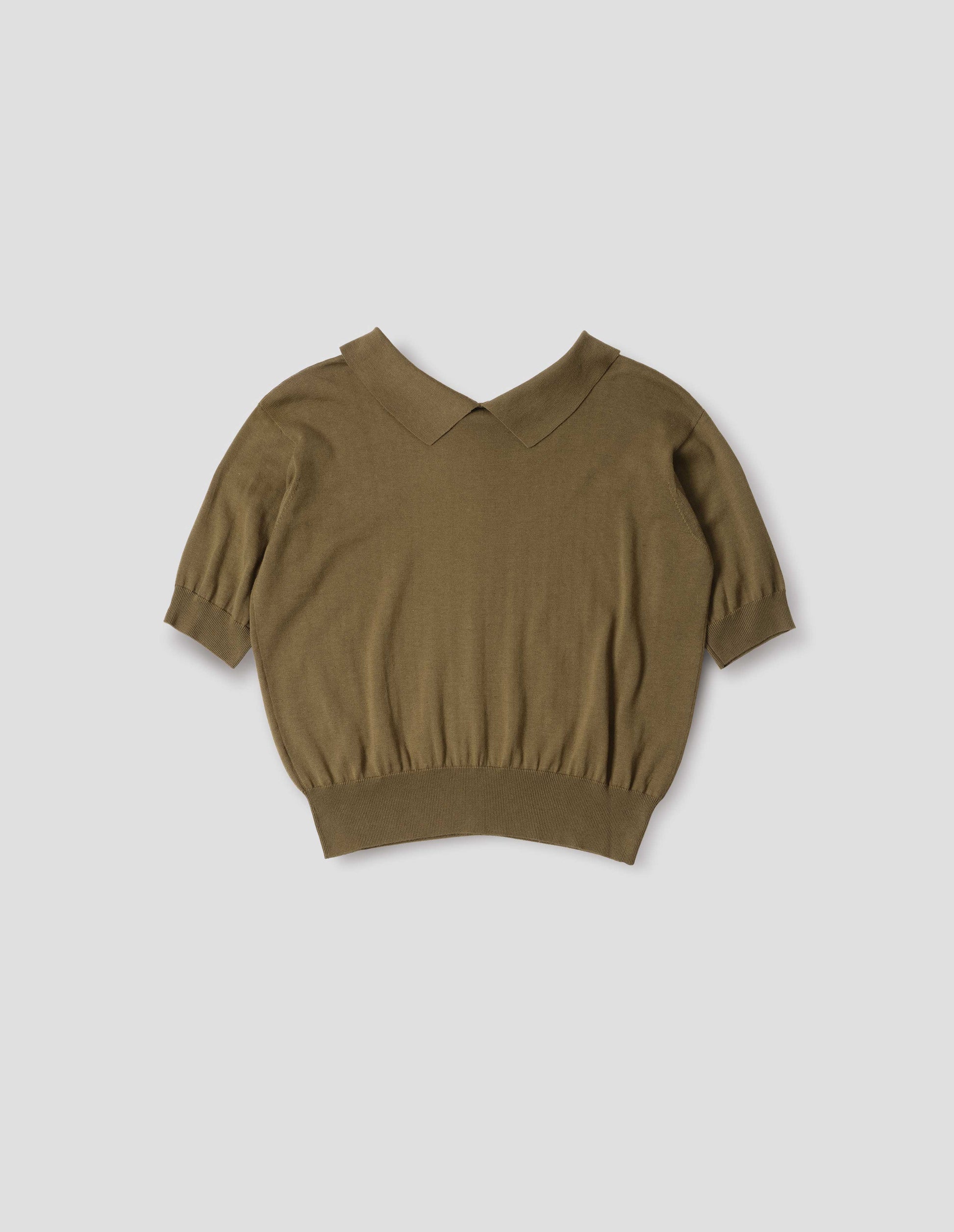 Green split collar knitted t-shirt with ribbed cuffs and hem. Back flat lay view.