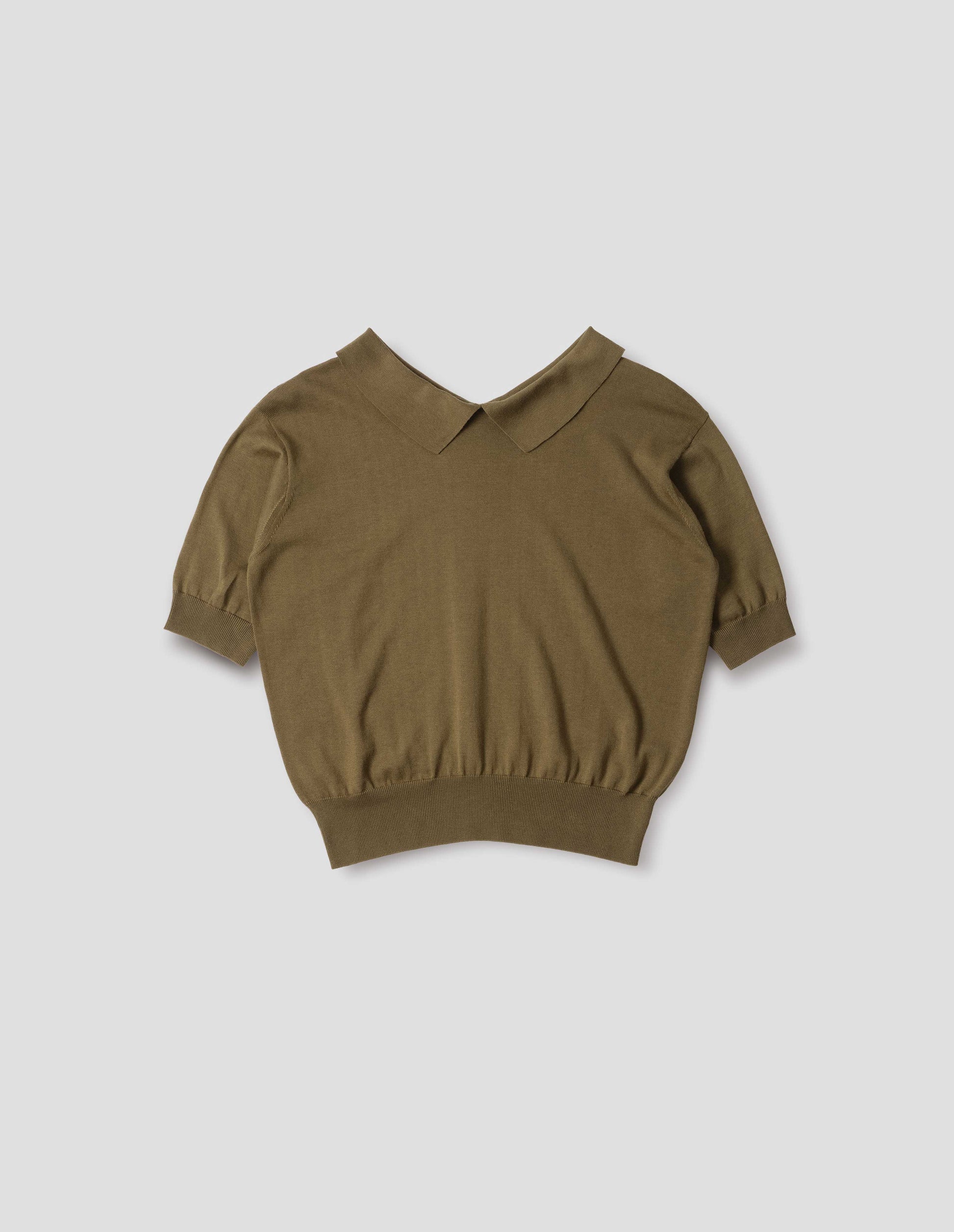 Green split collar knitted t-shirt with ribbed cuffs and hem. Front flat lay view.