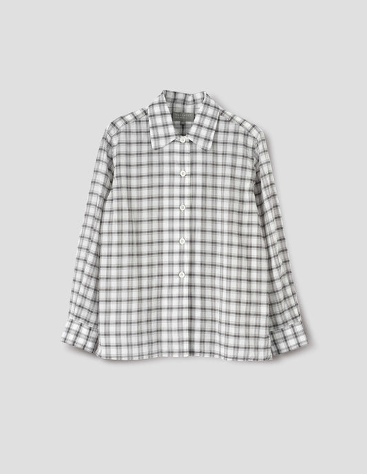 White with black check shirt with a curved collar and side split hem. Front flat lay view.